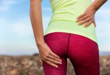 دونده در حال تجربه درد پیریفورمیس یا درد باسن